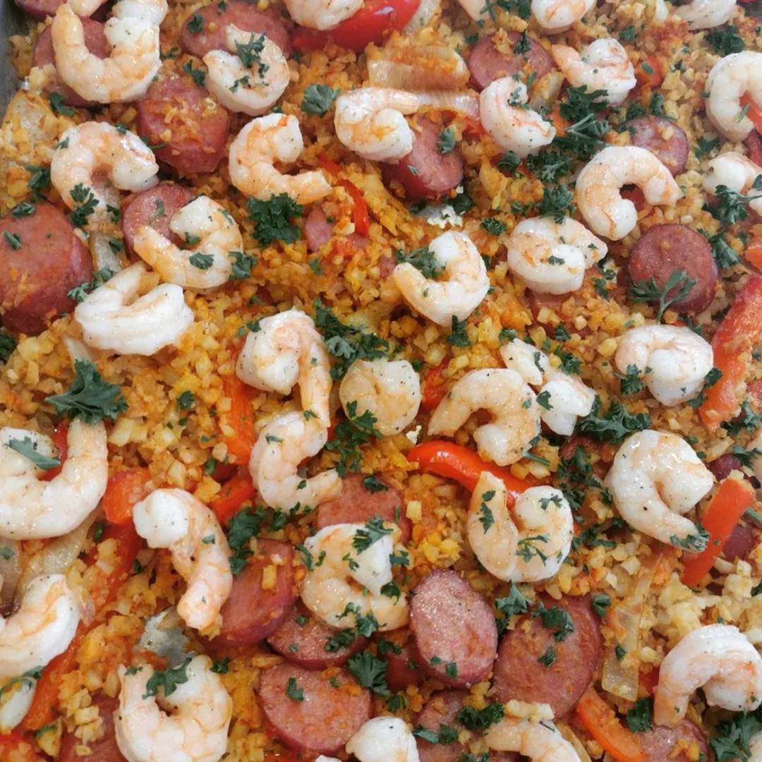 Shrimp and sausage on a sheet pan for jambalaya