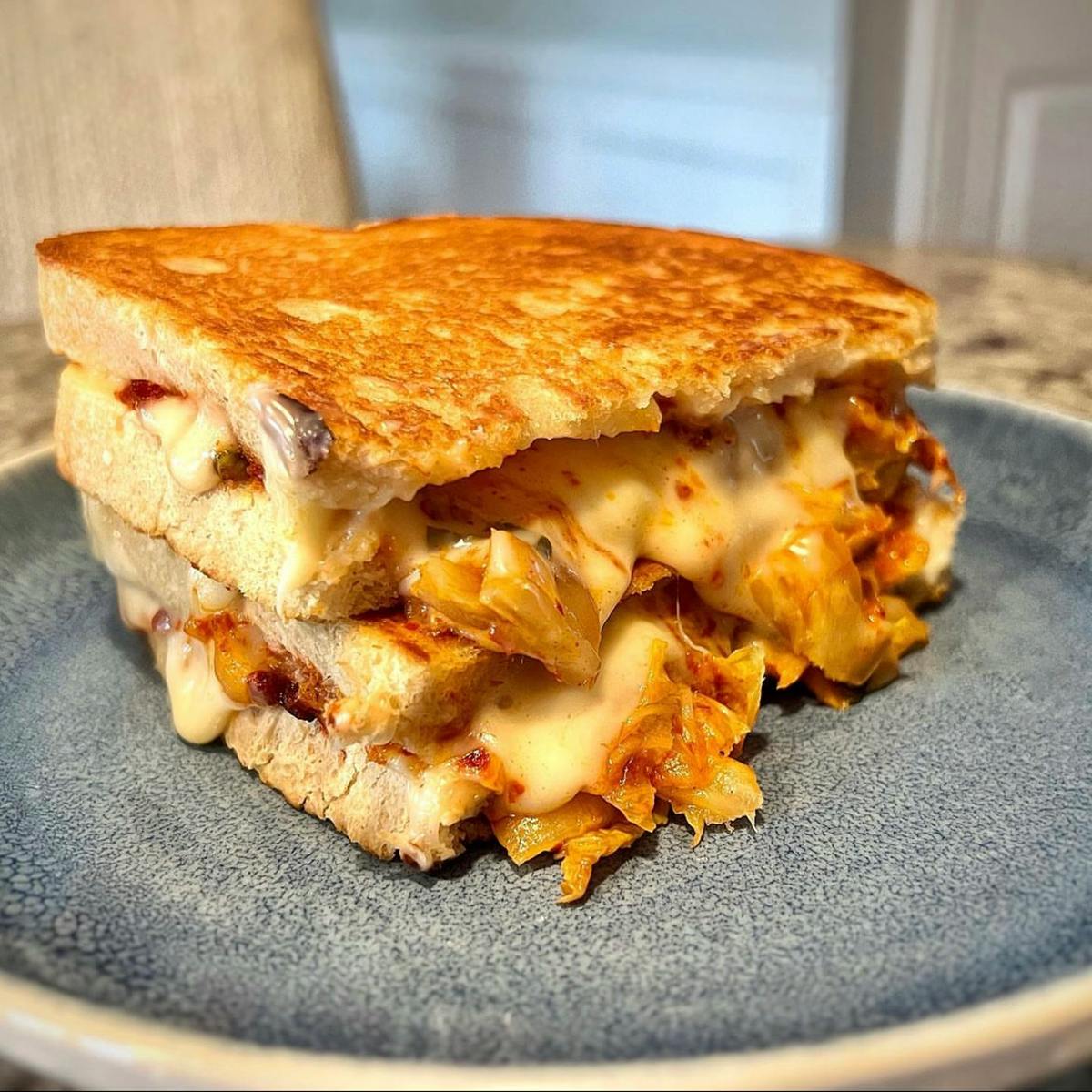 Kimchi grilled cheese sandwich on a plate