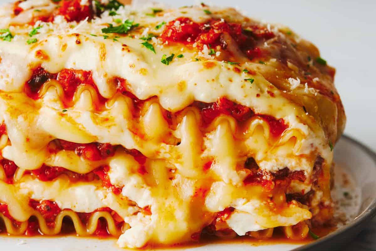 Lasagna on a plate with cheese