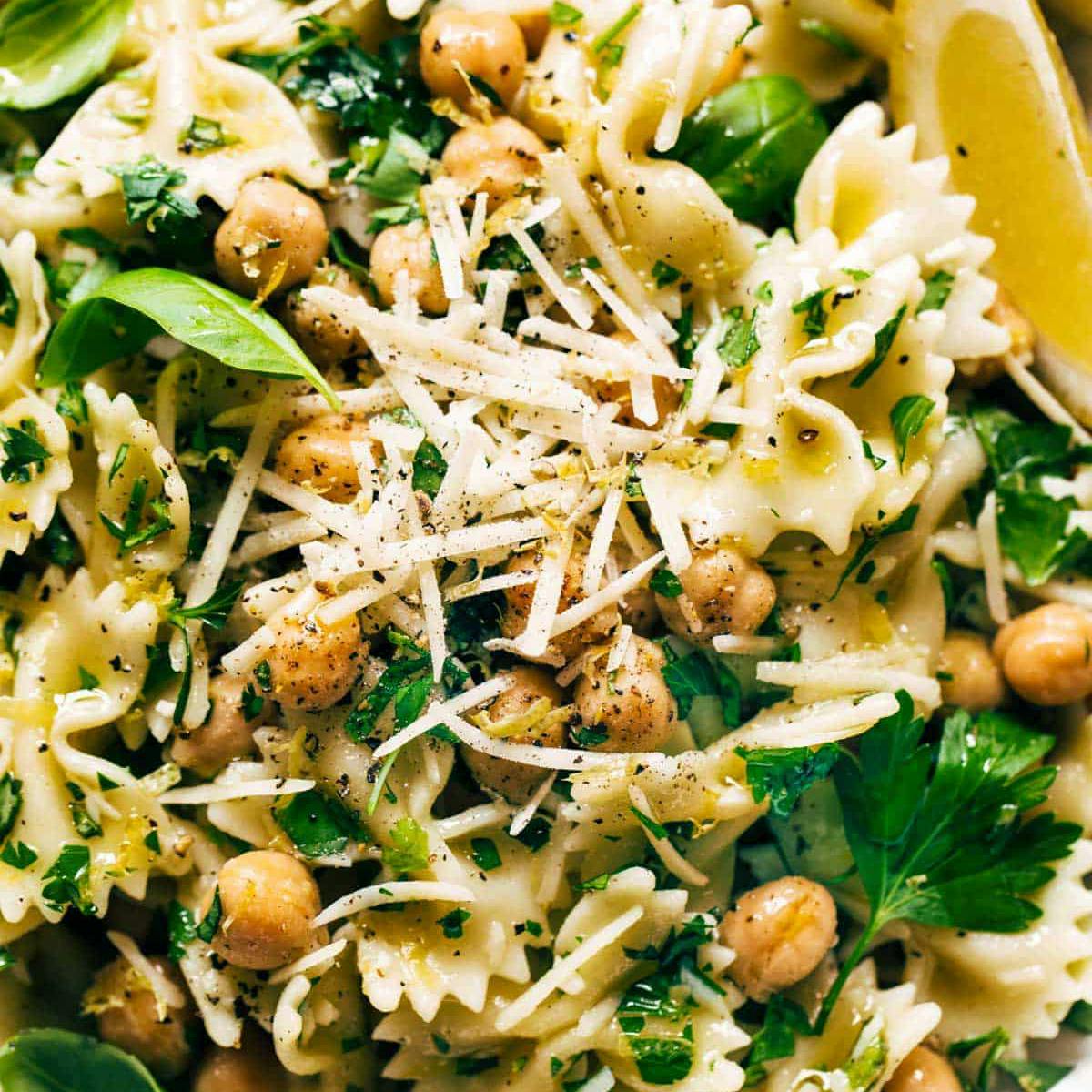 Lemon Herb Pasta Salad topped with shredded parmesan cheese