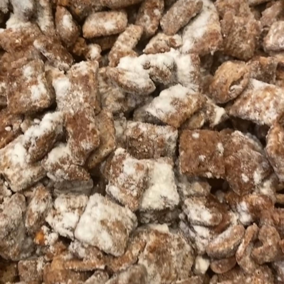 Puppy chow covered in powdered sugar