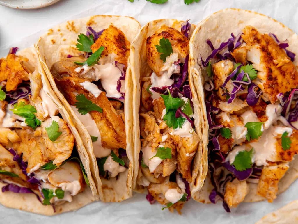 Mouthwatering Fish Tacos With Lime Crema