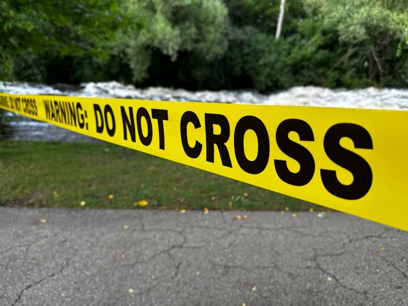 Yellow caution tape with "do not cross" text