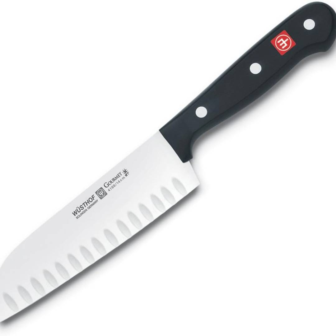 A Wusthof santoku 5 inch hollow edged knife