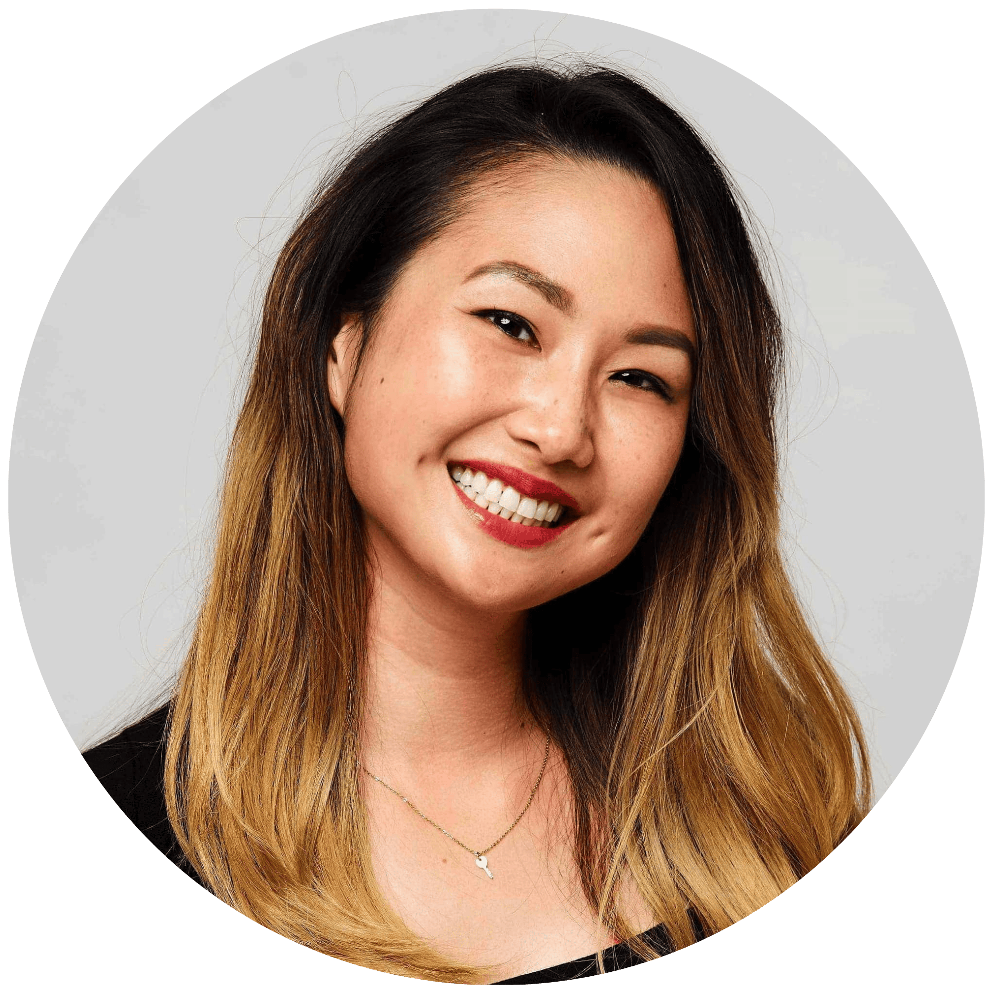 A lovely picture of Grace! She's against a plain white background, smiling brightly.