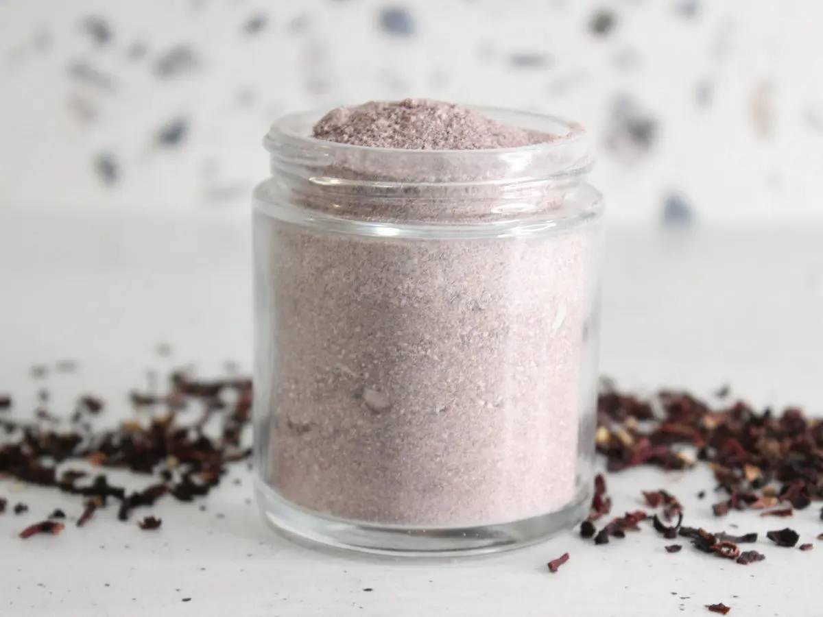 a jar of homemade hibiscus face scrub