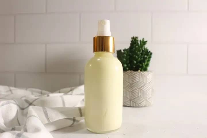 a spray bottle of homemade sunscreen spray
