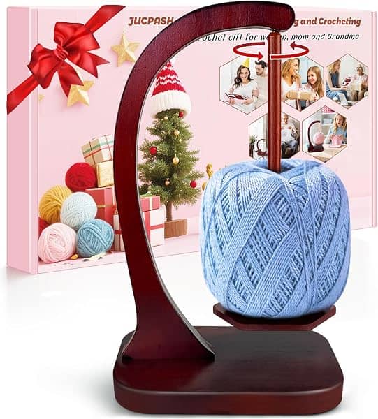 Wooden yarn holder with a ball of yarn