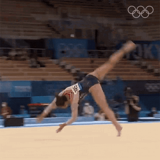 Gymnast Suni Lee sticks a landing