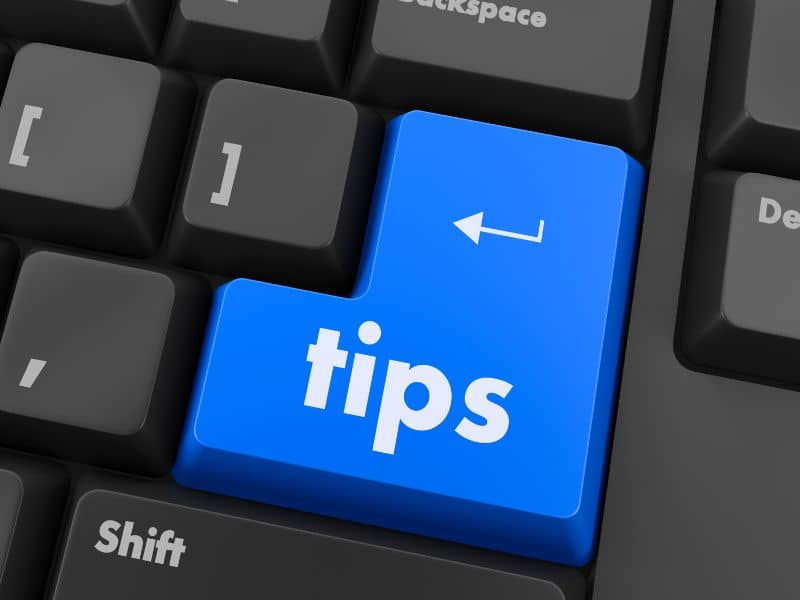 Blue computer key that reads tips