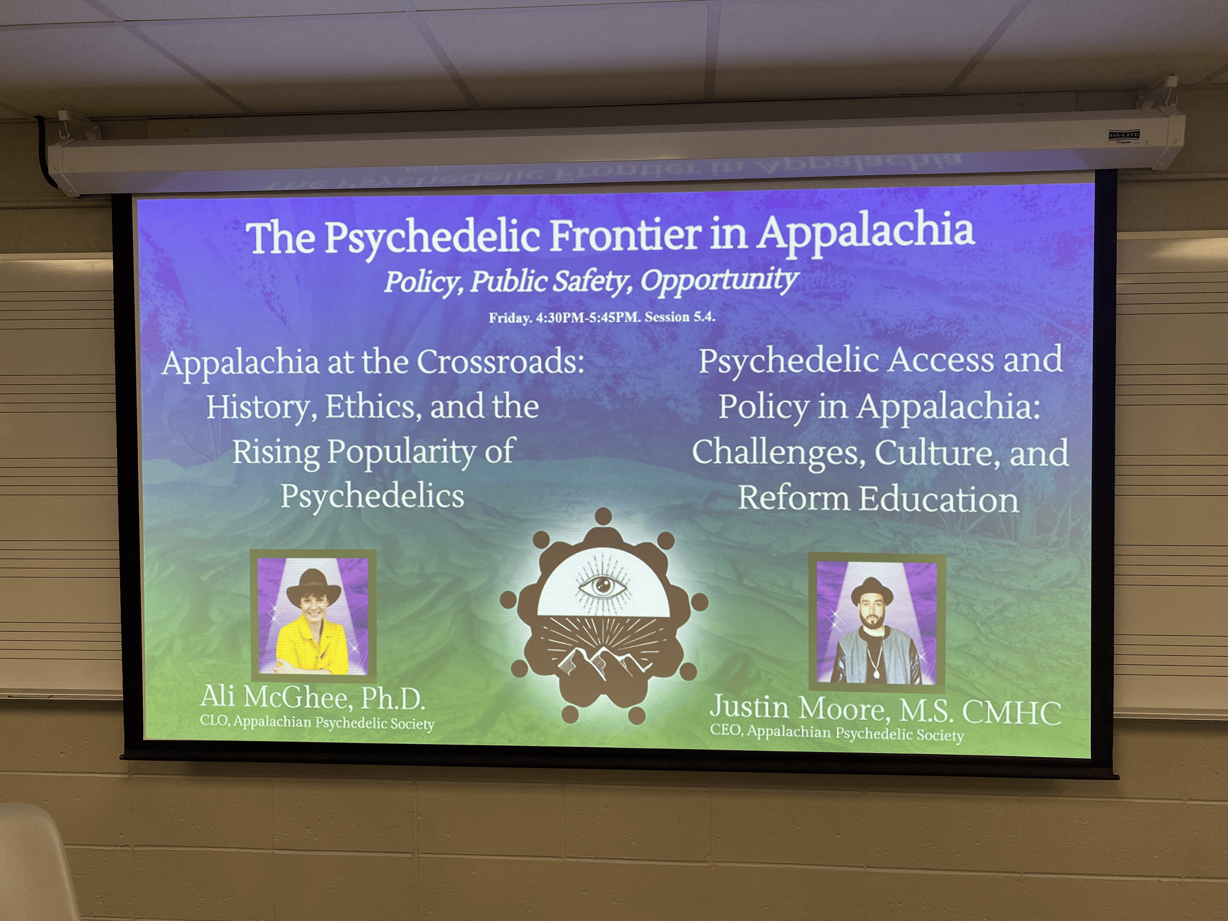 A projected powerpoint still from a conference