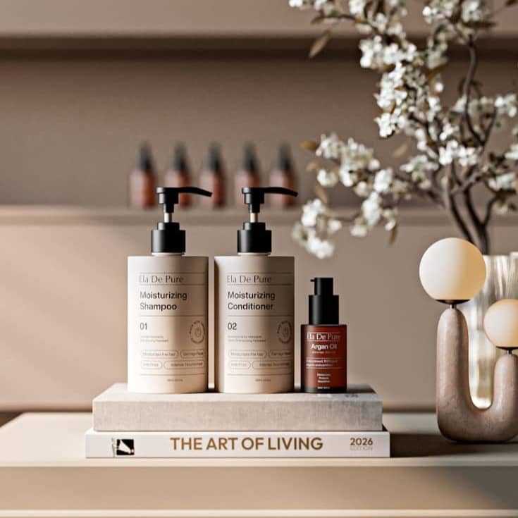 Shampoo, conditioner, and serum bottles on a book.