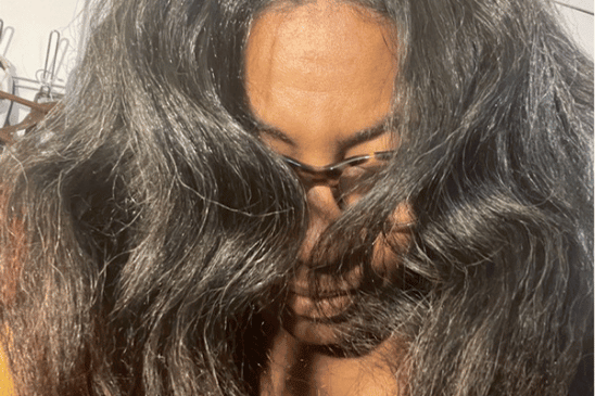 close up of woman's shiny moisturized hair