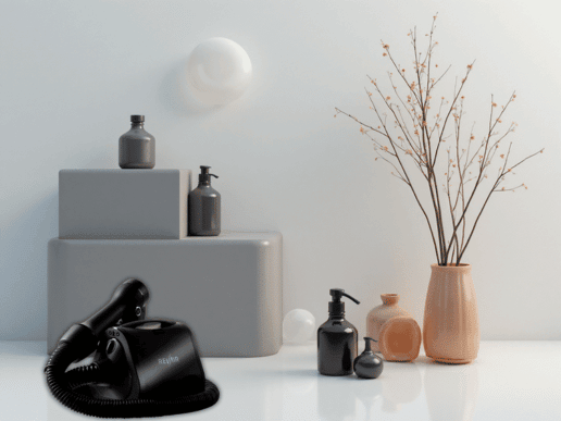 peaceful styled desk with beauty products and a revair hair dryer