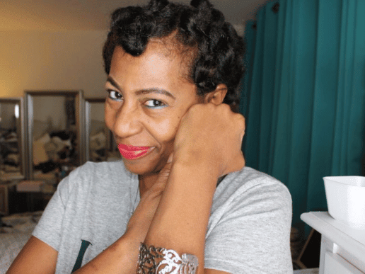 smiling black woman with pin curls