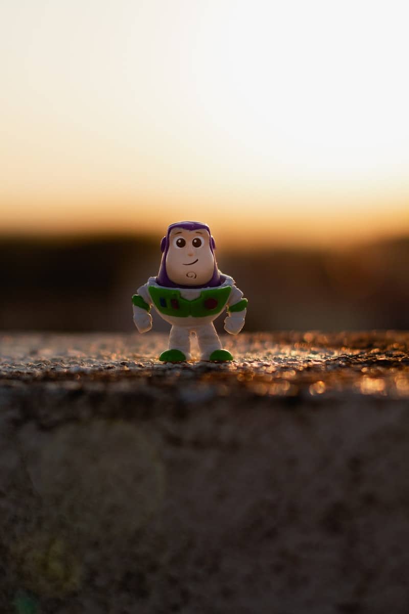green and white robot toy