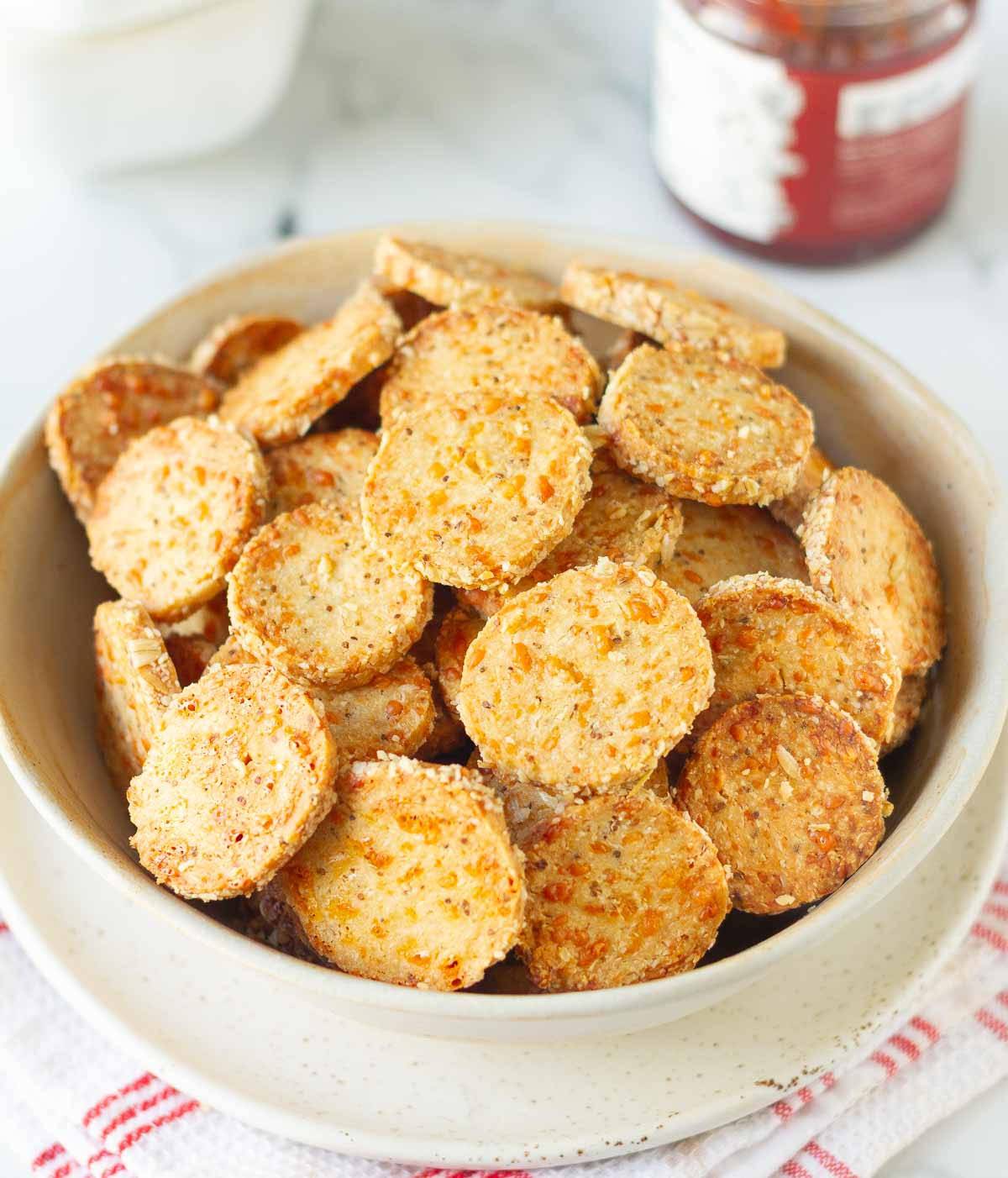 A bowl of cheese crackers.