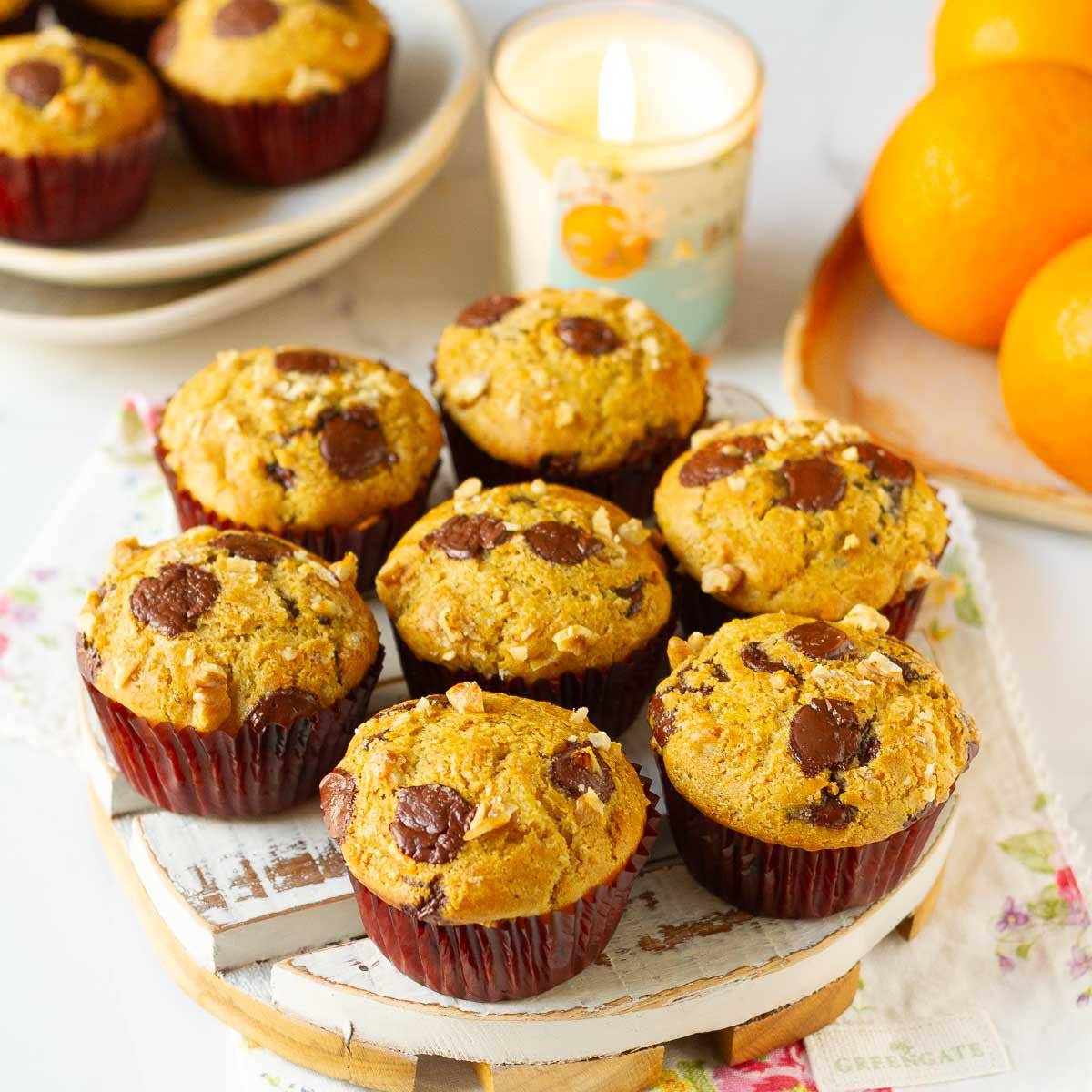 orange muffins on a white tray.