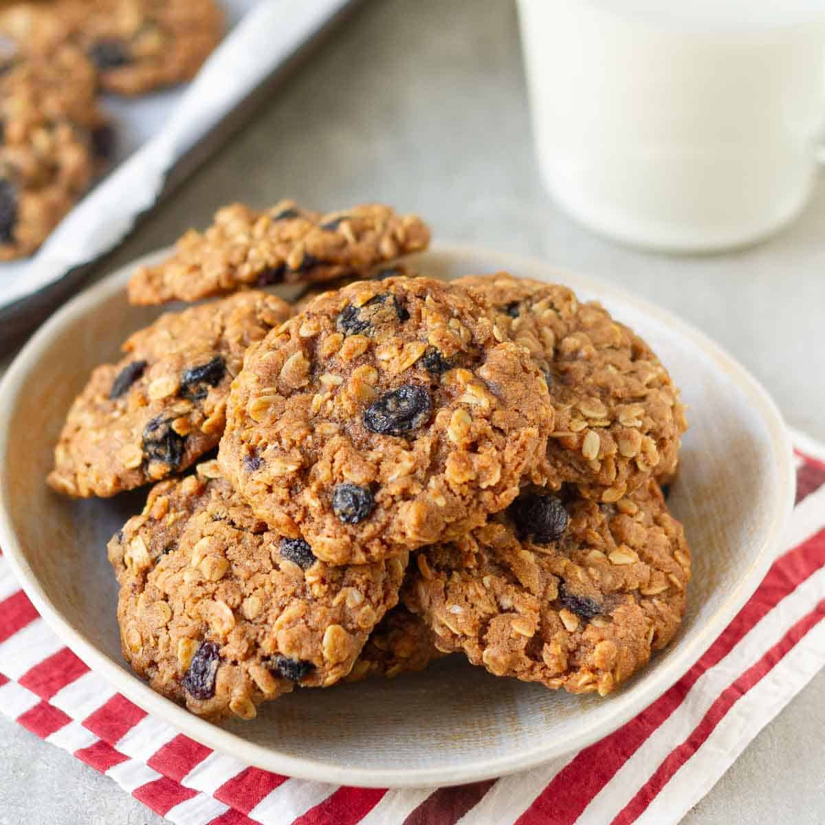 a stack of oatmeal cookies on a plate.