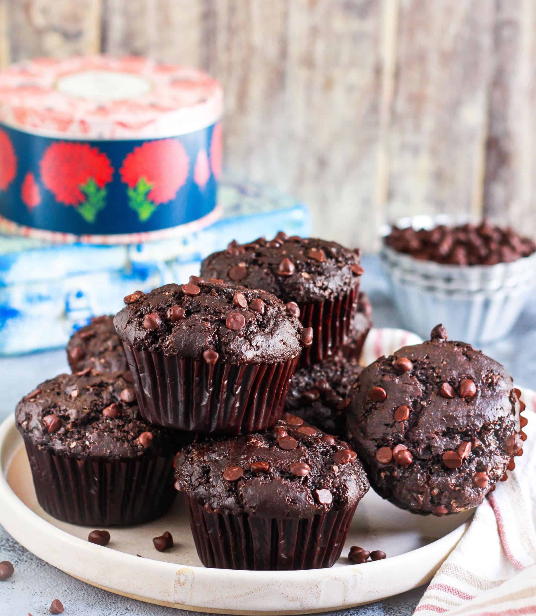 Chocolate muffins on a plate.