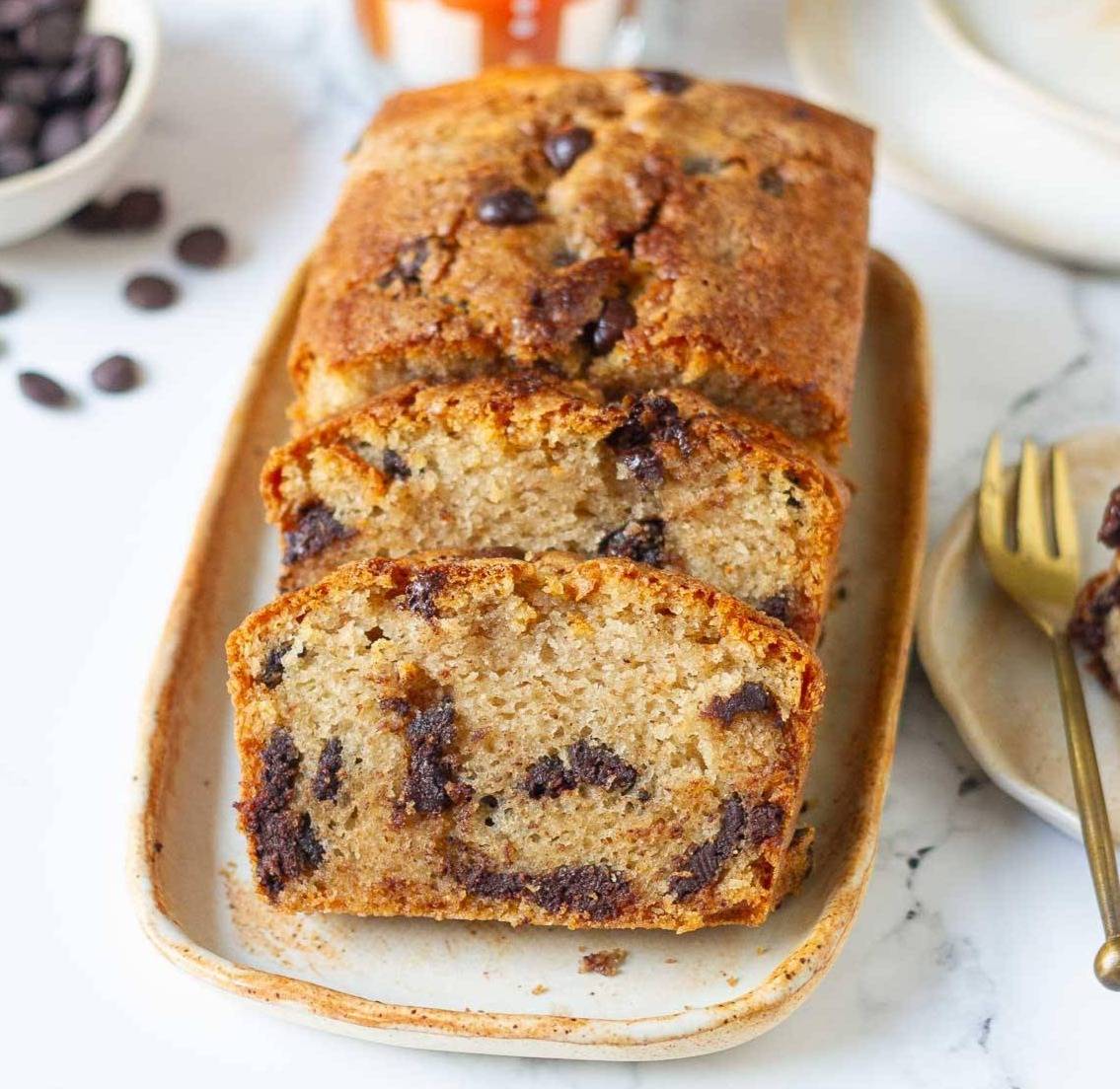 Sliced chocolate chip cake on a platter.