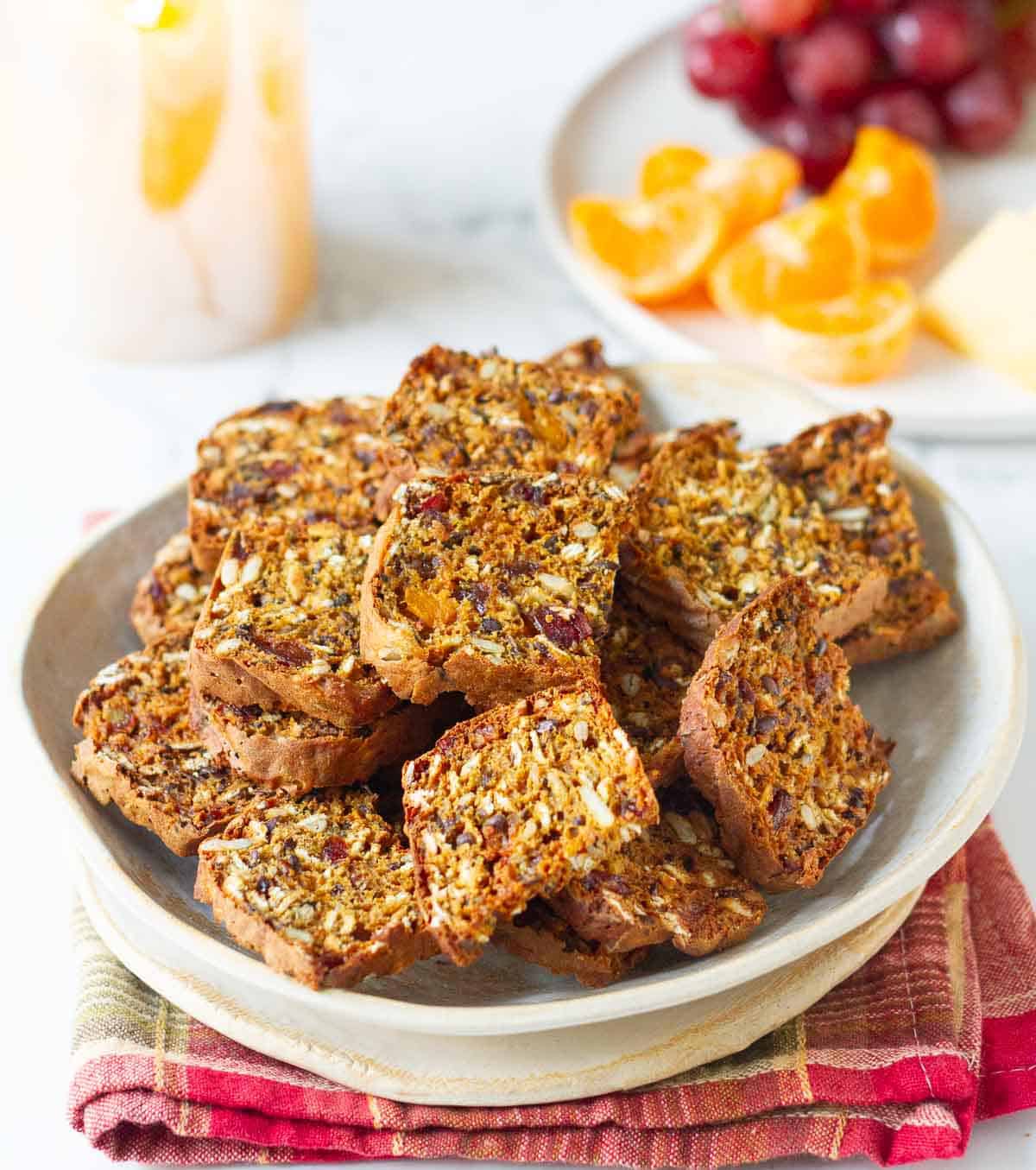Crackers with nuts and cranberries in a bowl.