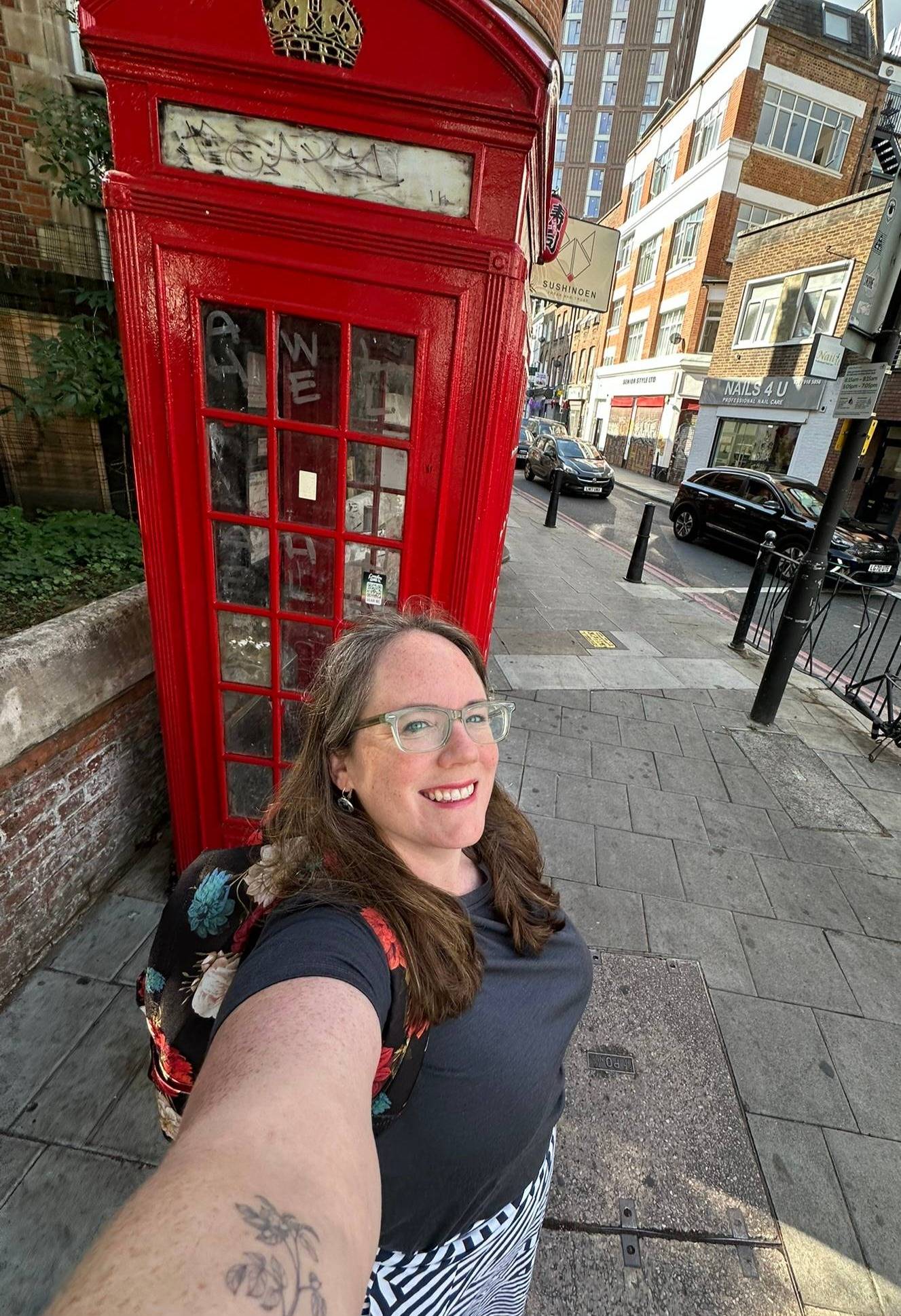 Eileen Cotter Wright in London this summer in front of a red phone booth