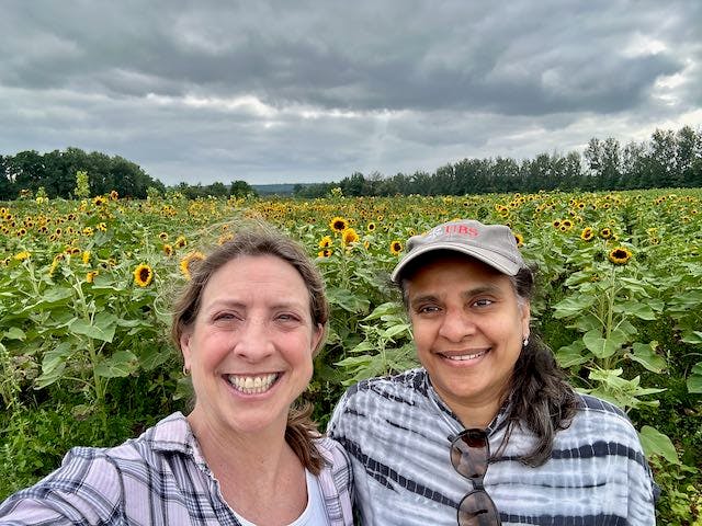Me and a friend in a field of sunflowers