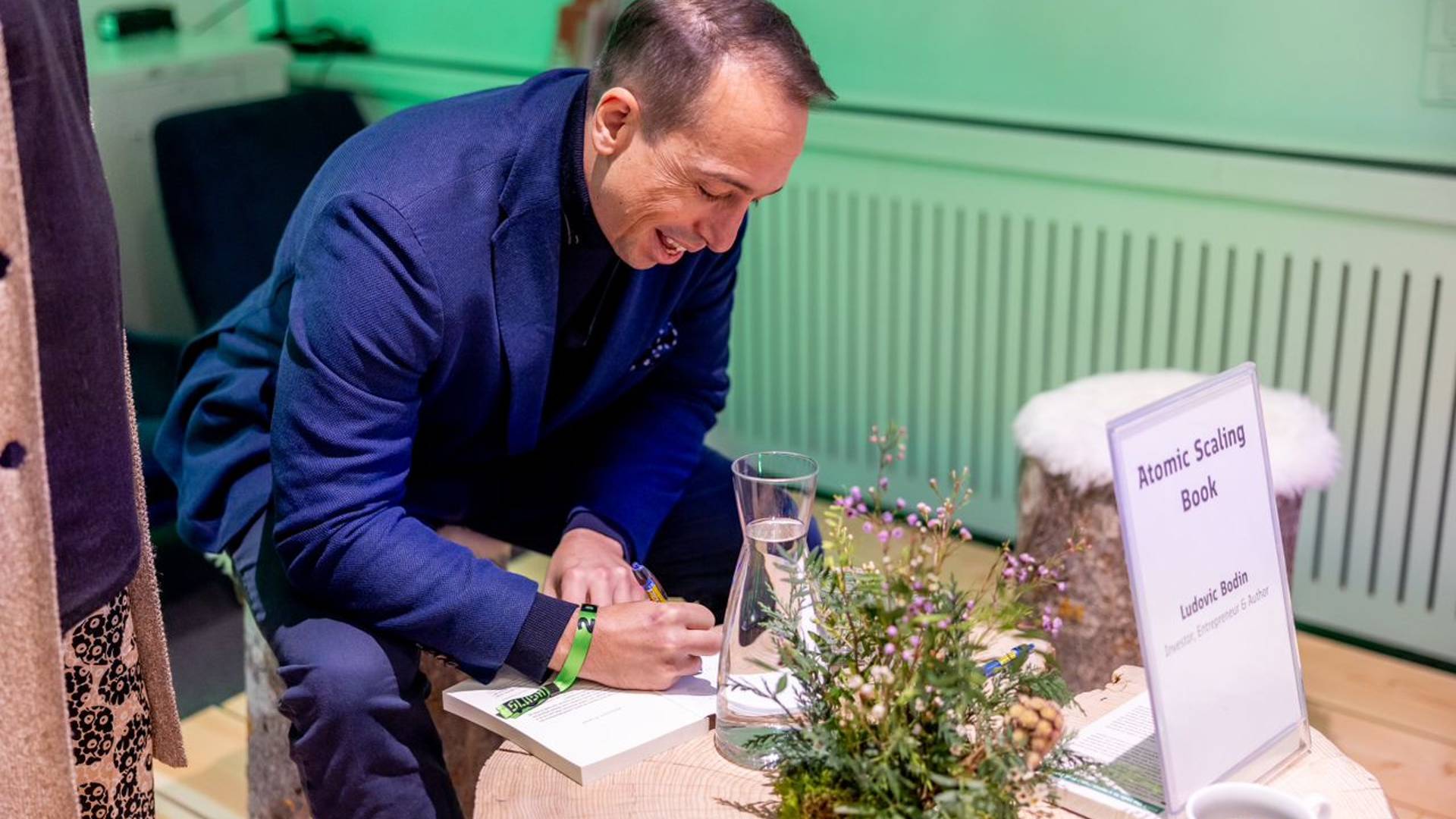 Signing a book