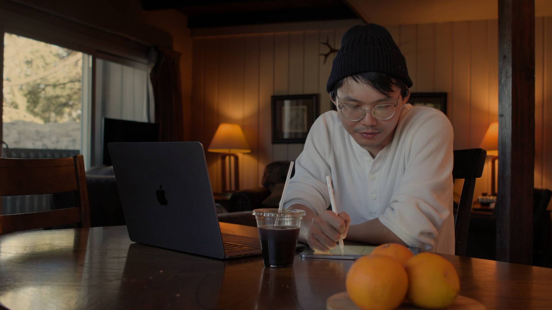 David working with a client on their video workflow