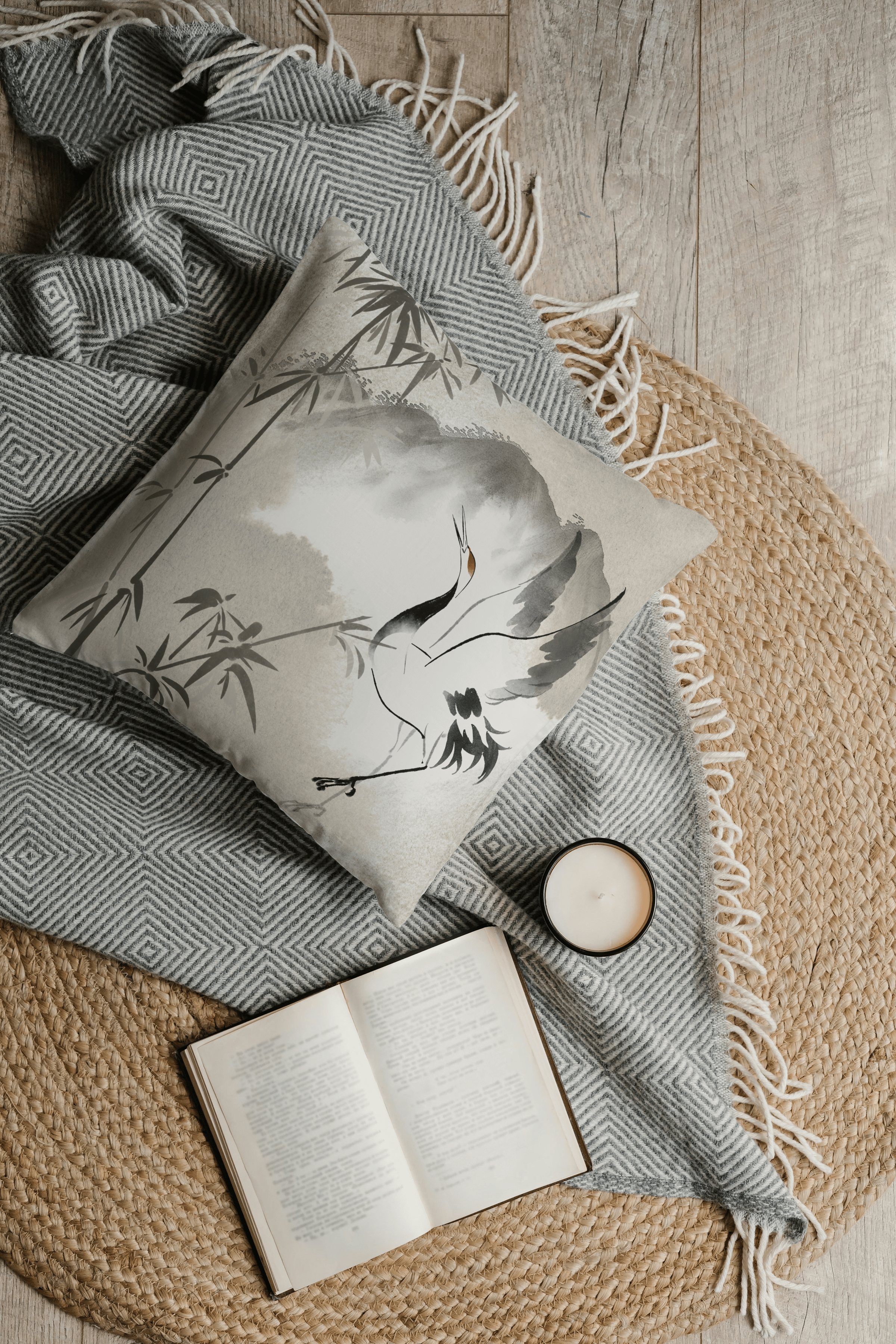 A watercolor crane and bamboo branches in front of a mountainscape.