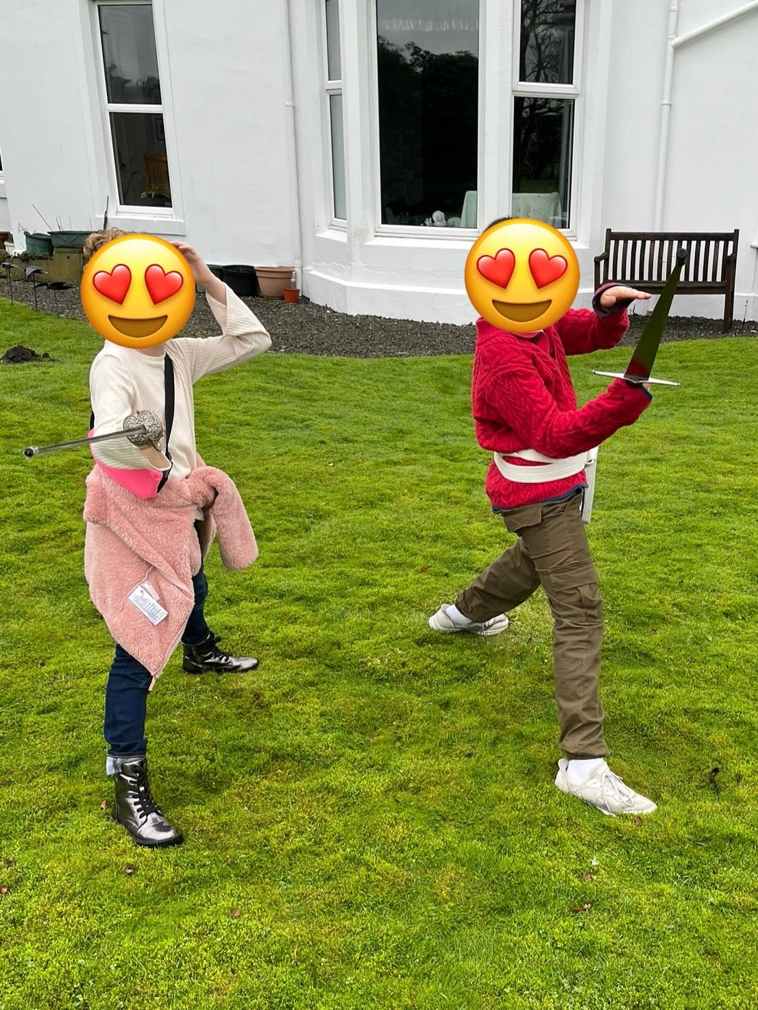 Two kids with swords