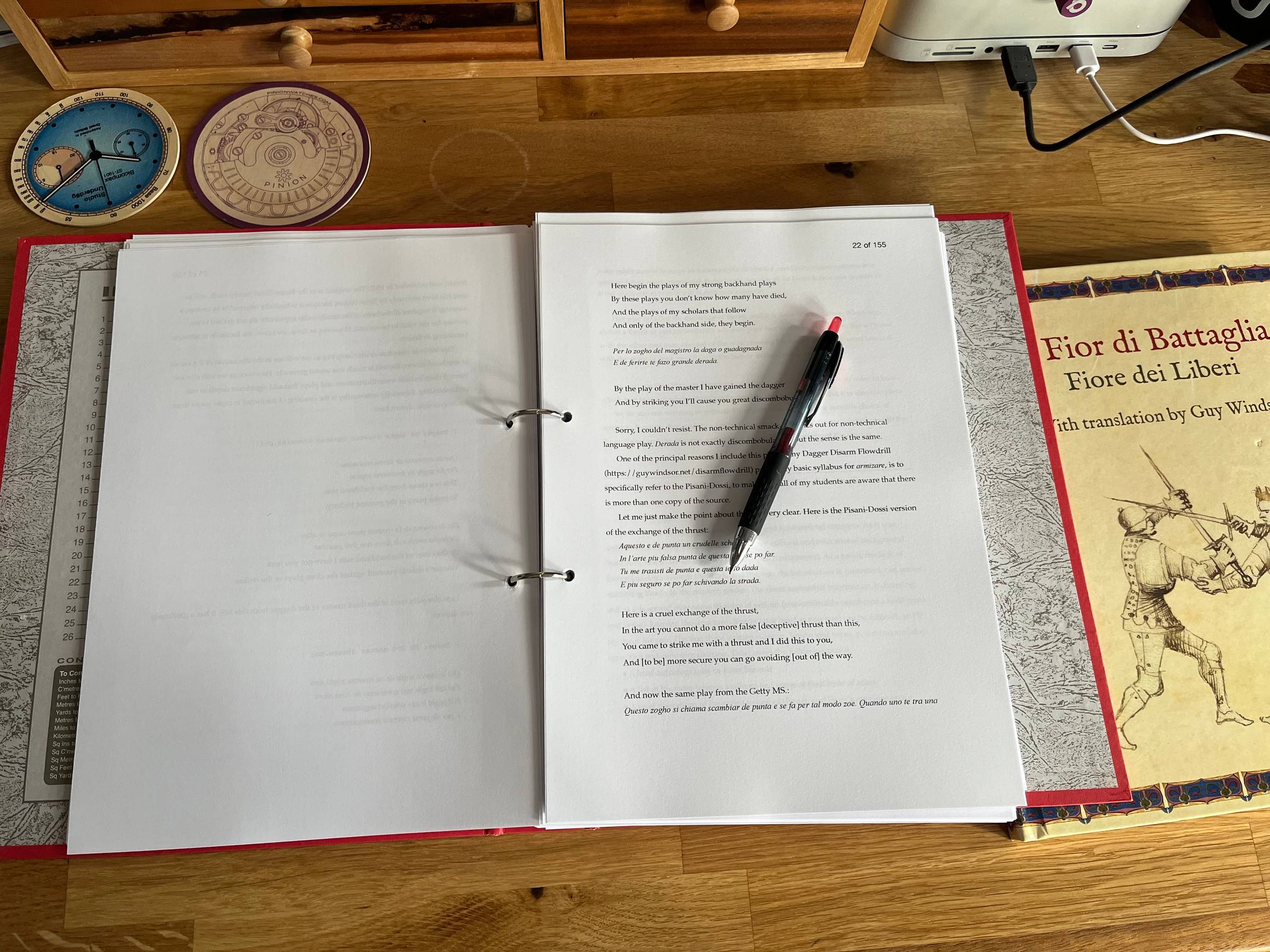 a folder of printed first draft, being edited.