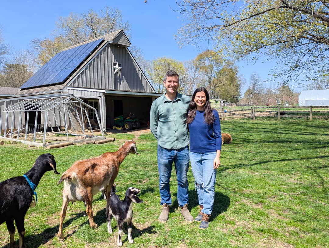 Katie and Charlie Swartz with their goats