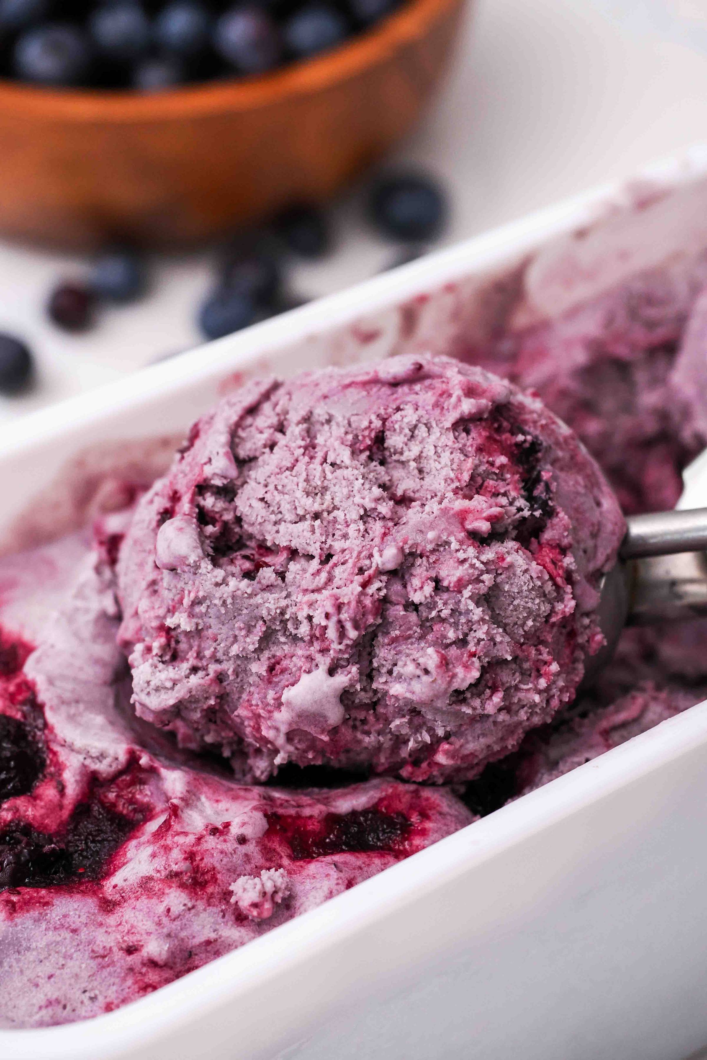A scoop of blueberry ice cream