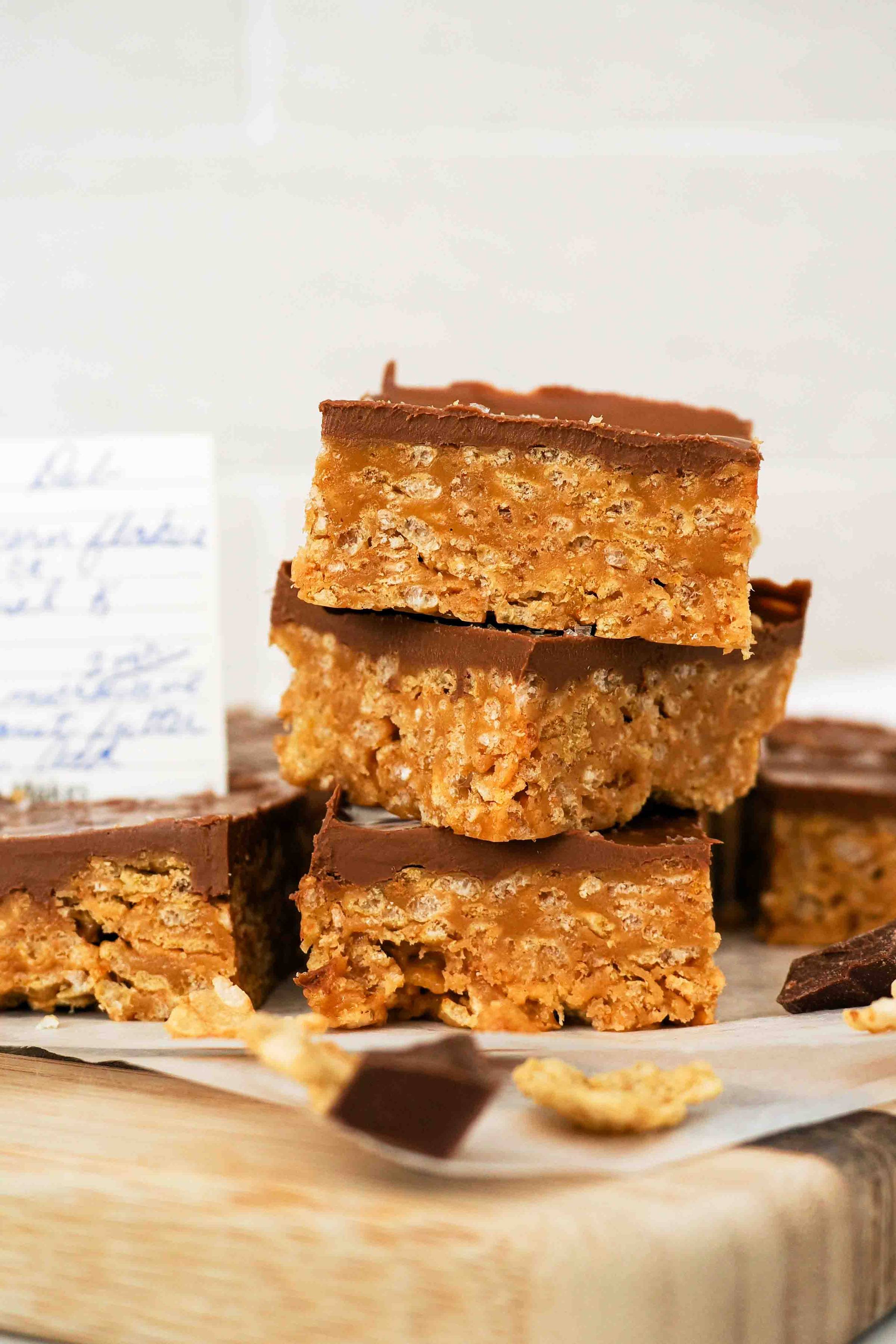 A stack of Special K bars on a cutting board.