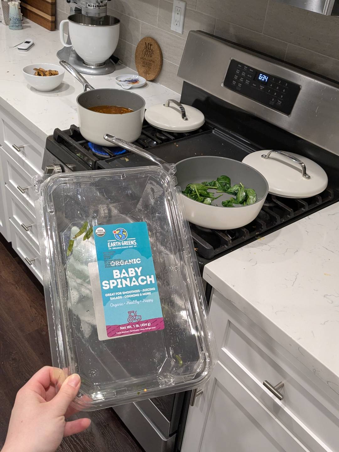 An empty container of spinach.