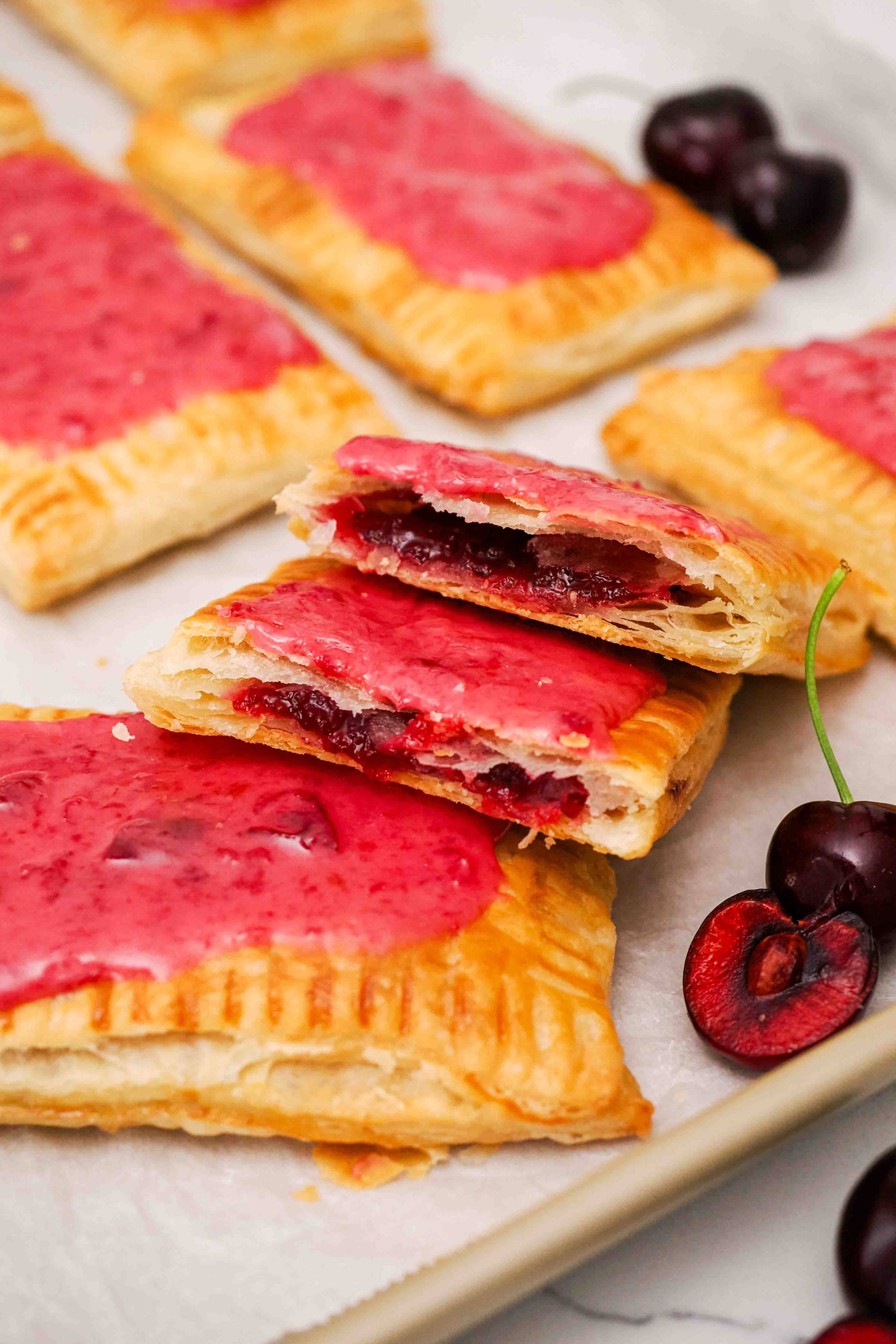 A homemade pastry with cherry jam inside