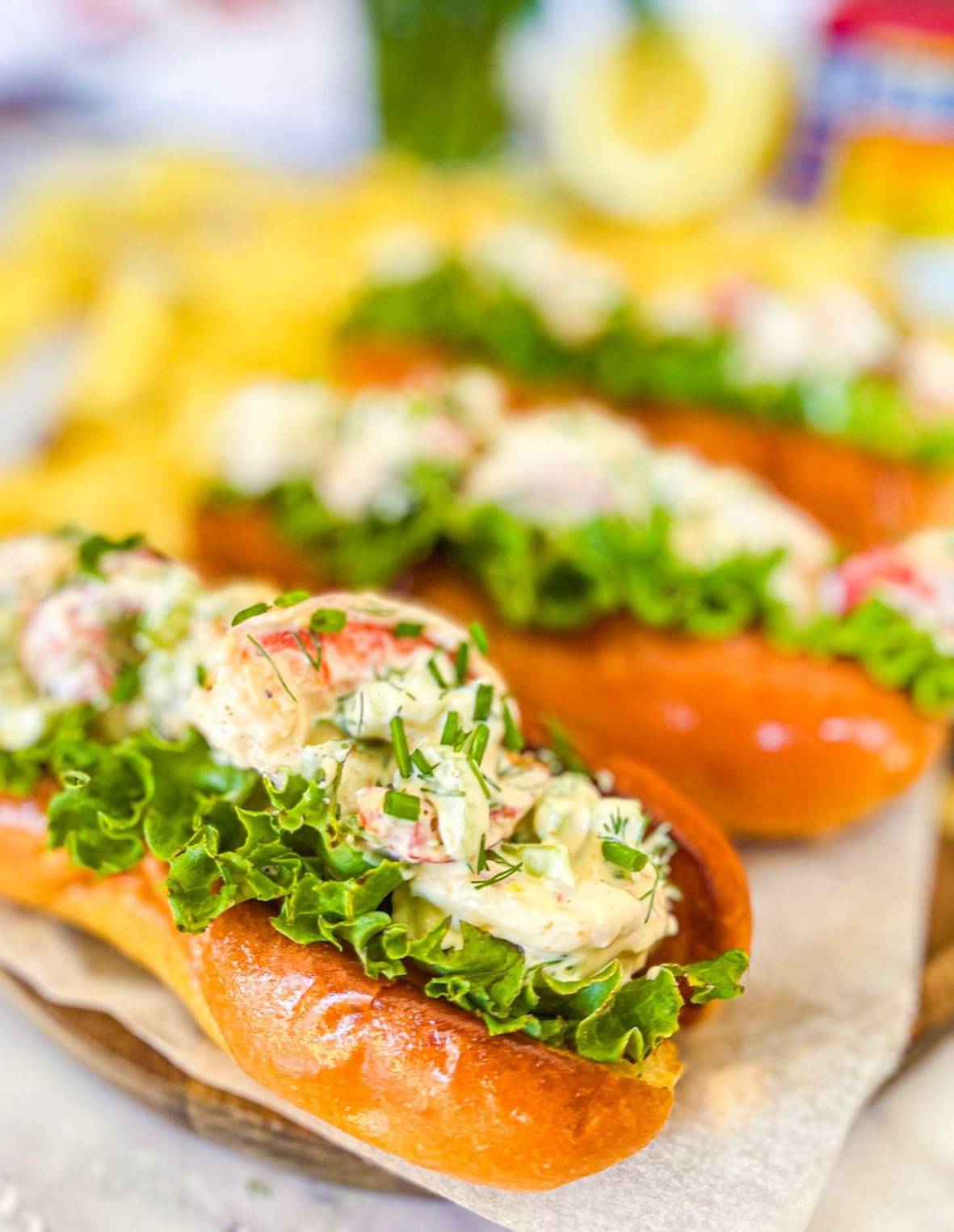 buttery brioche rolls piled high with creamy shrimp salad.