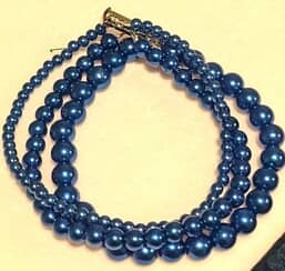 Blue pearl beads strung on three strands to create a beautiful bracelet!