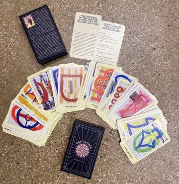 Photo of the Glyphs oracle card deck by artist Cheryl R. Riley.