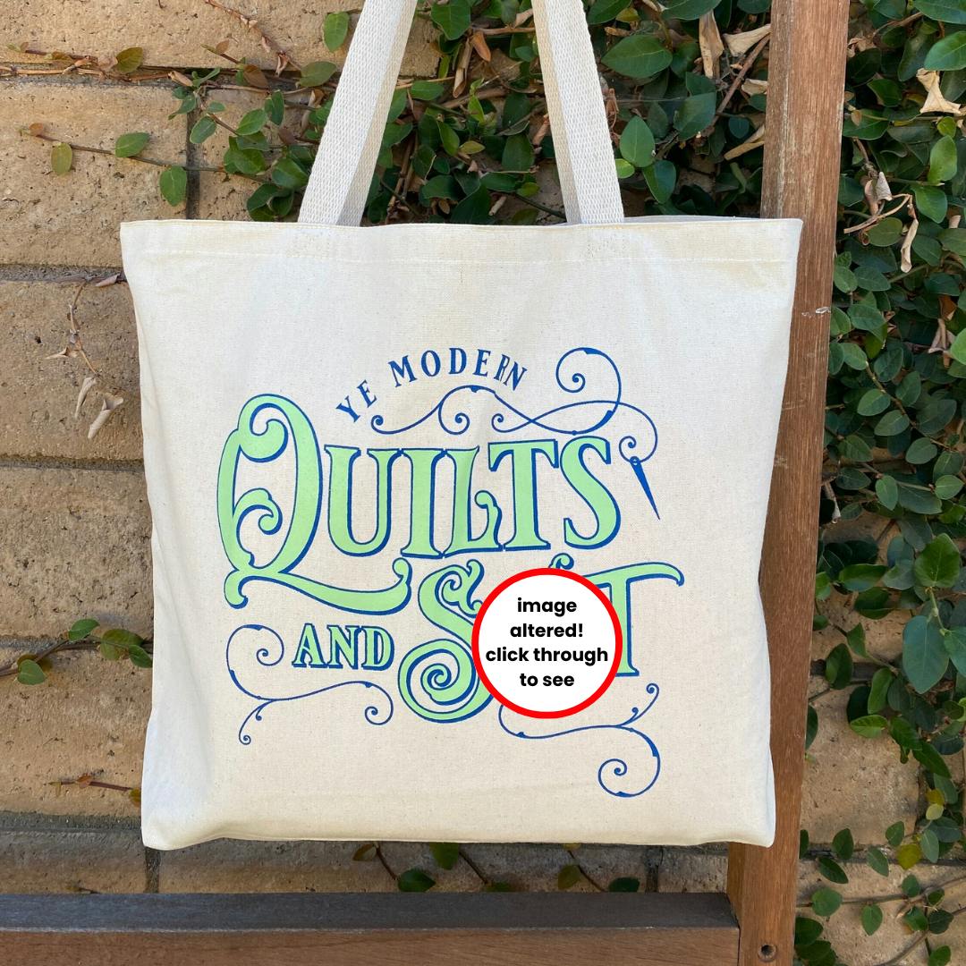 Photo of Project Leasa’s tote bag with the grownup word covered. The decorative text reads: Ye Modern Quilts and S**t