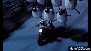 Animated image from the 1995 movie A Close Shave directed by Nick Park. The GIF shows a cadre of escaping sheep in formation atop a motorcycle.