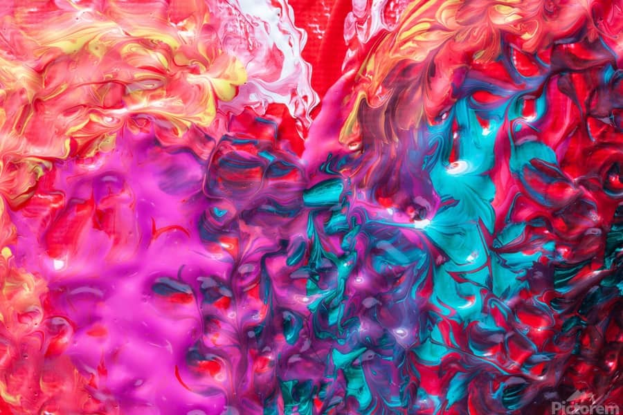 Photo of several colors of liquid paint partially swirled together. The colors include magenta, purple, light blue, yellow, red, and white.