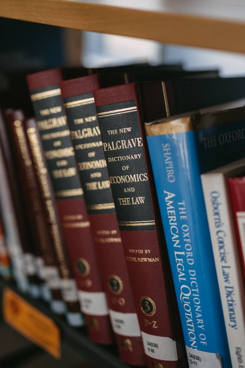 Books on a shelf in a library.
