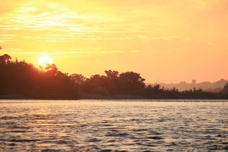 Sunrise over calm water — metaphor for clarity and resilience.