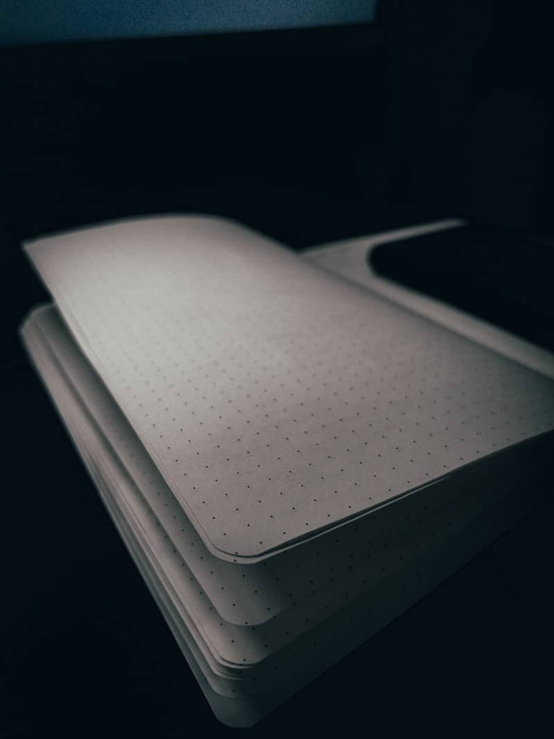 a close up of a notebook on a desk