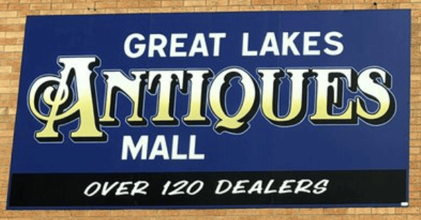 A sign advertising the Great Lakes Antiques Mall: over 120 dealers