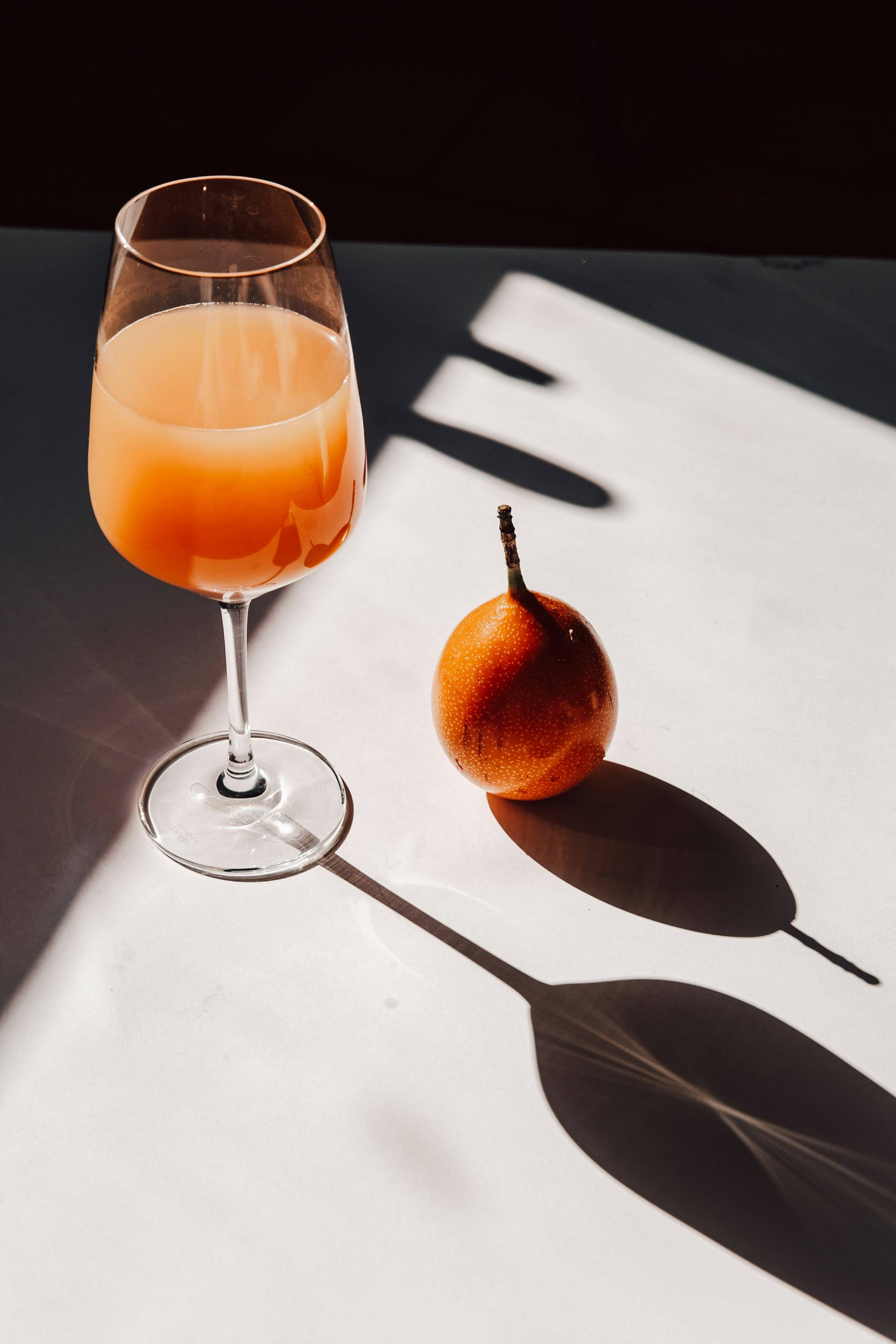 This image shows a wine glass with what I think is pomegranate juice and what I think is a pomegranate. Y'see spirituality in everyday life doesn't have to be complicated. In fact, I'd say it absolutely can't be complicated!