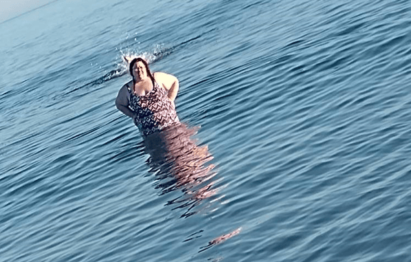 A picture of me, standing about waist deep in the sea in Tramore last Friday evening. 